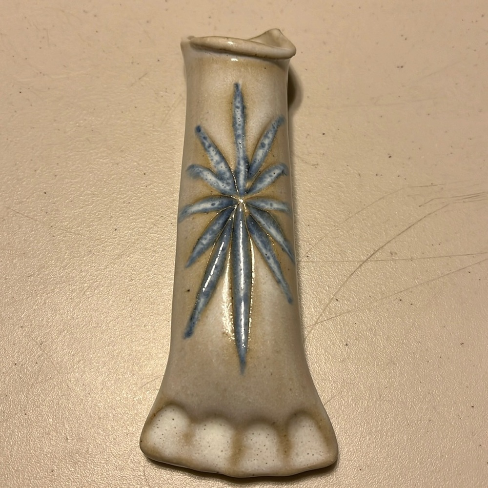 Vintage wall pocket signed. Beautiful flower. Well made pottery